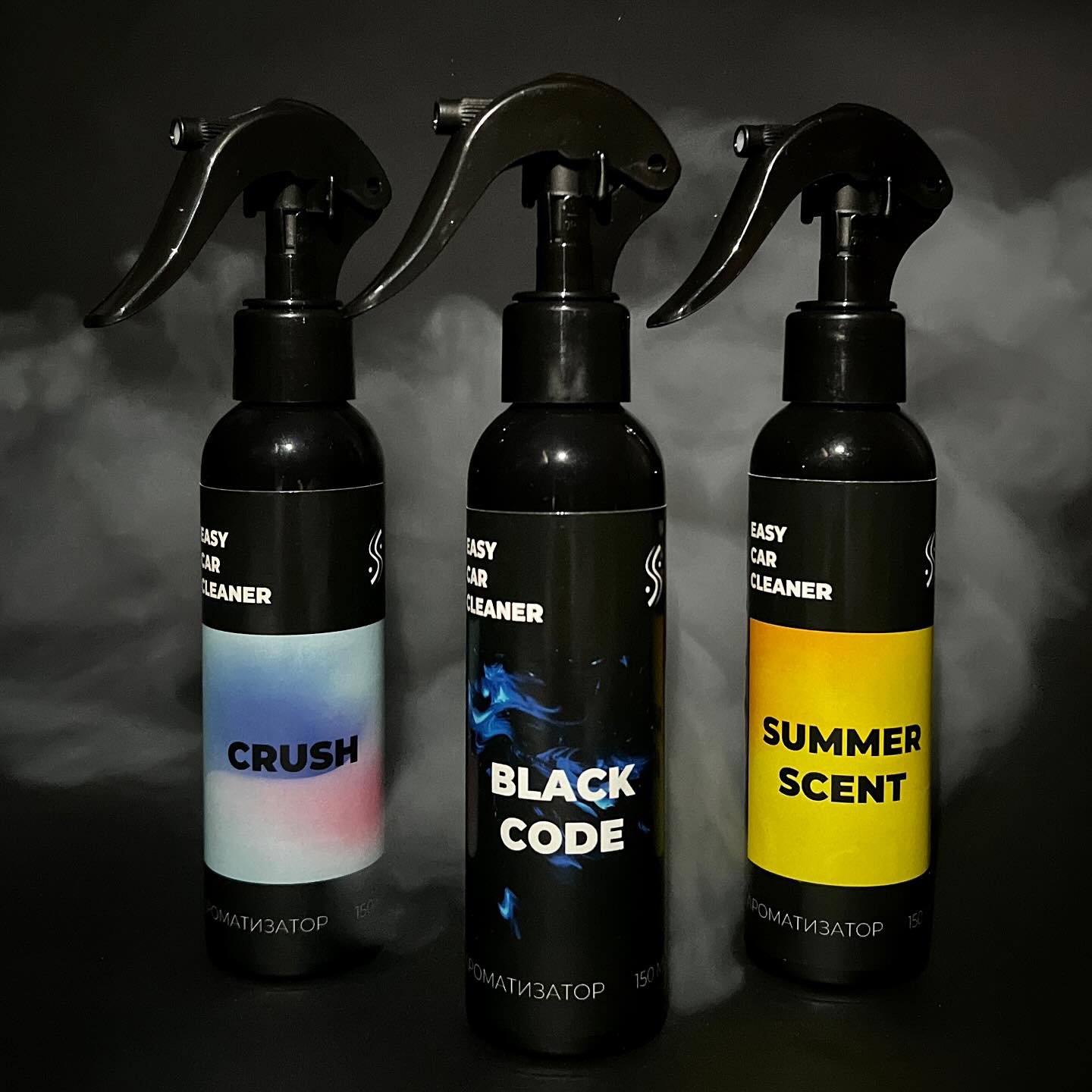 Crush, Black Code, Summer Scent fragrances on smoky dark background